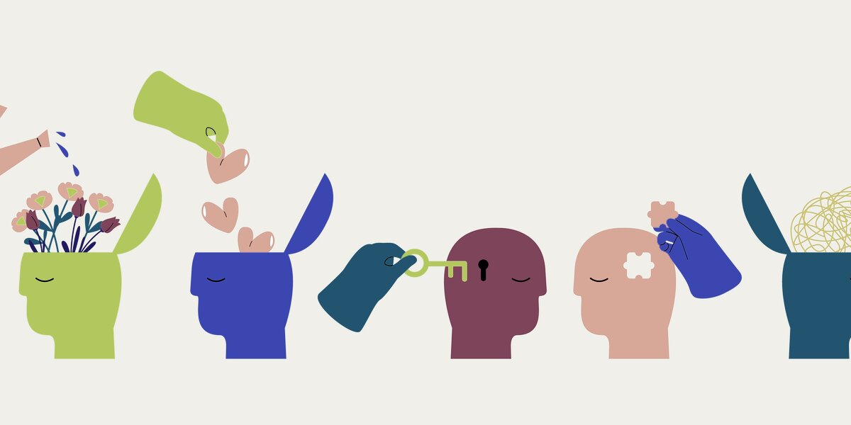 Illustration of open minds with flowers, hearts and puzzle pieces — anxiety and OCD therapy